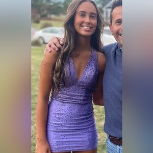 Beautiful purple sequence dress. Worn once. Size 00. Great for hoco or prom